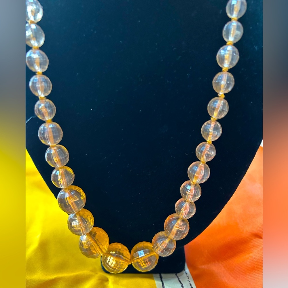 VTG Signed Graduated Plastic Bead Champagne colored necklace. By Kenneth Lane.